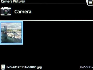 To use a saved picture:Go to the required folder.Highlight the required picture and press the Navigation key.