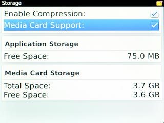 Scroll to Media Card Support and press the Navigation key to turn on use of memory card.