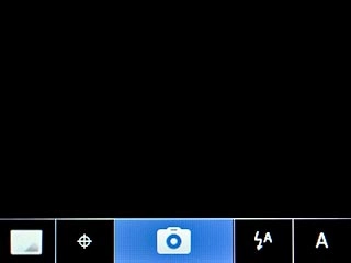 Highlight the camera icon and press the Navigation key to take the picture.