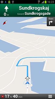 The navigation window with information about your route is displayed.The next turn and the next route detail are displayed at the top of the display.