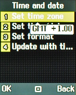 Scroll to Set time zone and press the Navigation key.