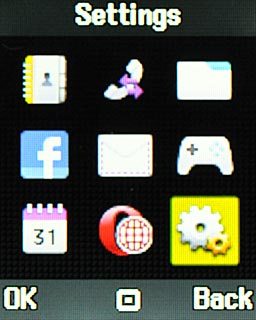 Scroll to Settings and press the Navigation key.