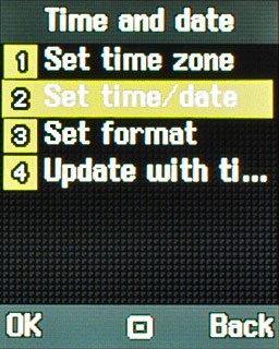 Scroll to Set time/date and press the Navigation key.