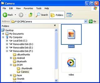 Highlight the required picture or the required video clip and move or copy it to your computer.