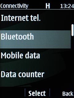 Scroll to Bluetooth and press the Navigation key.