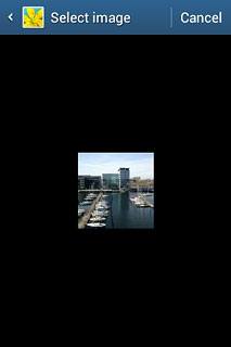 Go to the required folder.Press the required picture.