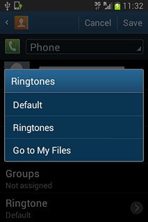To assign your phone's current default ring tone:Press Default.