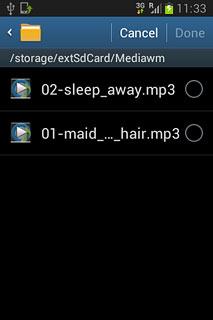 Go to the required folder.Press the different ring tones to listen to them.