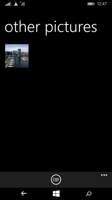 Go to the required folder.Press and hold the required file until a pop-up menu is displayed.