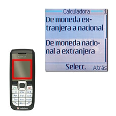 Vaya a De moneda extranjera a nacional y pulse la tecla de navegación.