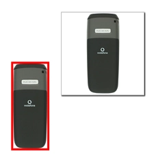 Presione la tapa trasera hacia abajo para soltarla del teléfono.Retire la tapa trasera.