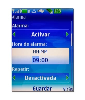 Vaya a Hora de alarma e introduzca la hora a la que debe tocar la alarma.