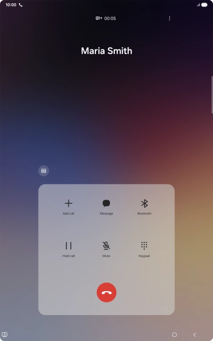 Press the end call icon.