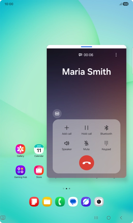 Press the end call icon.