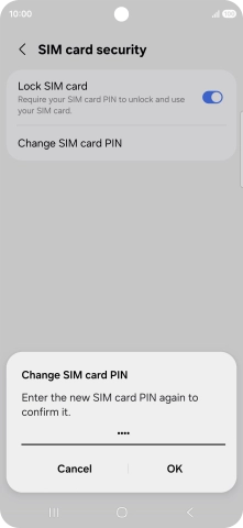 Key in the new PIN again and press OK.