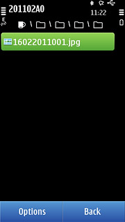 Go to the required folder.Press and hold the required file until a pop-up menu is displayed.