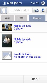 Press the Photos tab.Follow the instructions on the display to see your pictures.