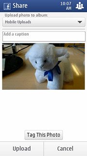 If required, press Add a caption to add text to the picture.Key in the required text.