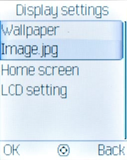 Scroll to Wallpaper and press the Navigation key.