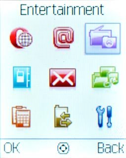 Scroll to Entertainment and press the Navigation key.