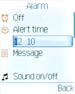 Highlight the field below Alert time and key in the time for the alarm.