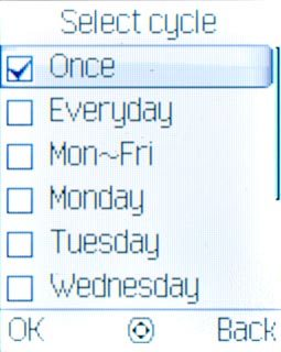Highlight Once, Everyday, Mon~Fri or the required day and press the Navigation key.