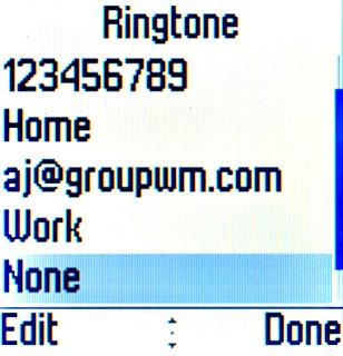 Highlight the field below Work and press the Navigation key.