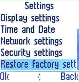 Scroll to Restore factory settings and press the Navigation key.