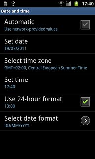 Press Automatic to turn automatic date and time update on or off.