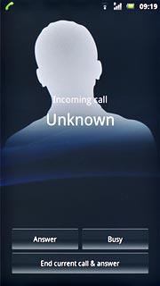 When you have an ongoing call, the new call is signalled by a sound.Press Answer.