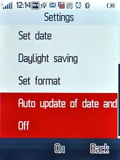 Press Auto update of date and time to select Off or On.