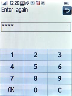 Key in the new PIN again and press OK.
