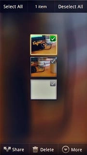 When a picture or video clip is ticked (V), it's selected.