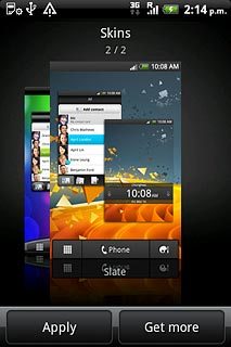 Slide your finger right or left on the display to select the required theme.