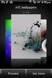 Slide your finger right or left on the display to select the required background image.