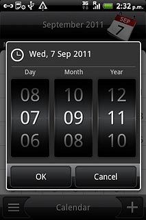 Slide the numbers up or down to select the date.