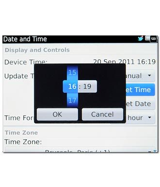 Slide hours and minutes up or down to set the time.