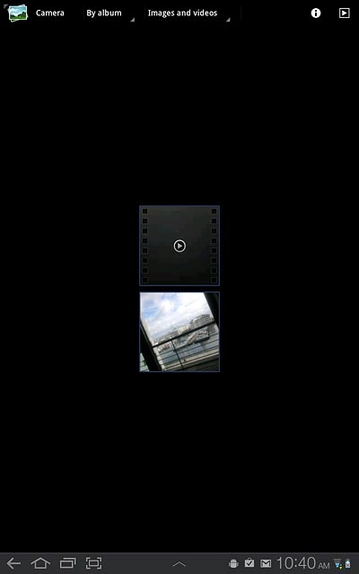 Go to the required folder.Press the required picture or the required video clip.