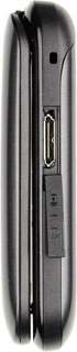 Connect the charger to the socket and to a wall socket to charge the battery.