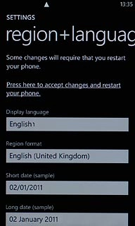 Press Press here to accept changes and restart your phone.Wait a moment while your phone is restarted.