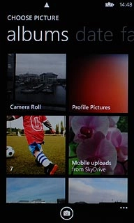 To take a new picture:Press the camera icon.