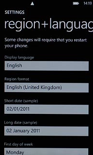 Press the field below Display language.
