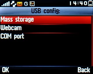 Scroll to Mass storage and press the Navigation key.