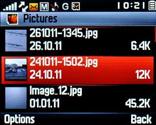 Go to the required folder.Highlight the required picture or the required video clip and press Options.