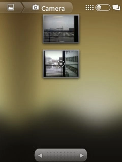 Go to the required folder.Press and hold the required picture or the required video clip to select it.