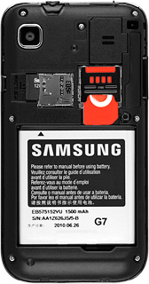Take hold of the bottom of the battery and remove it.