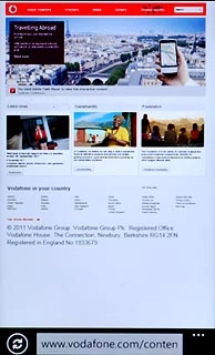 Press the address bar at the top of the display.