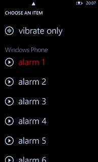 Press the playback icon next to the different alarm tones to hear them.