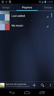 Press Playlists at the top of the display.
