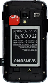 Slide the memory card into the holder and press it until it clicks into place.